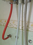 Image: New red gas pipe and jubillee clips - Click to Enlarge