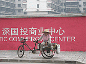 Image: A Local Scavenger Woman Taking a Break From The Pressures of Modern City Life in Foshan