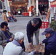 Locals Playing Chinese Chess on the Pavement