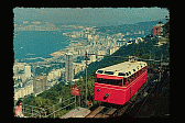 Image: The Peak Railway; pictured is an old time trolley train, today replaced by a tram. Note the background. Picture courtesy Jethro Chan - Click to Enlarge