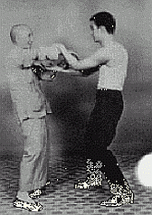 Image: Ip Man practicing with his talented student Bruce Lee
