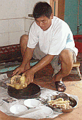 Image: Uncle Preparing Chicken for the Table - Toisan